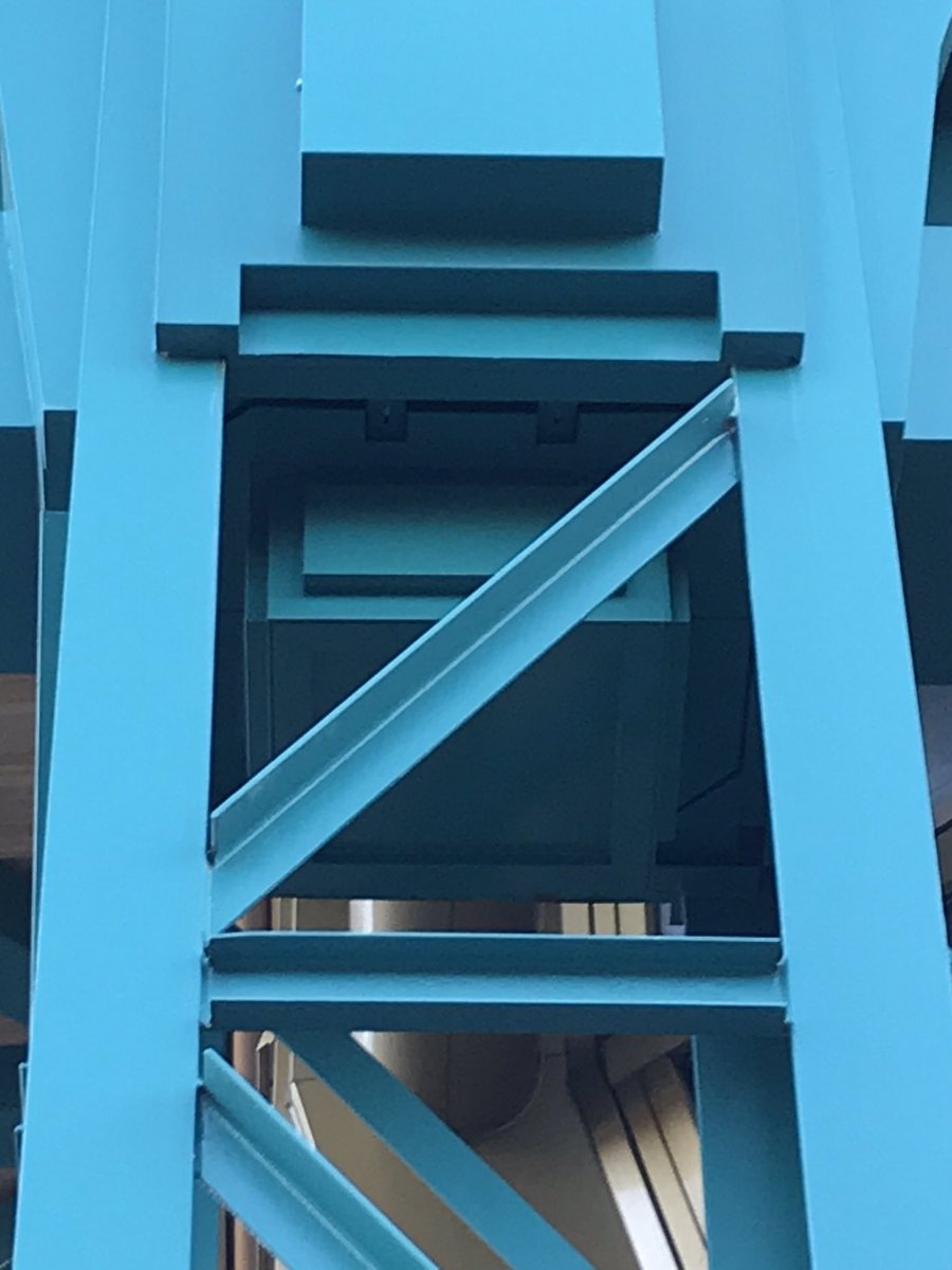Blue Boxes inside all the exterior Columns of the Cafe Hyperion Building
