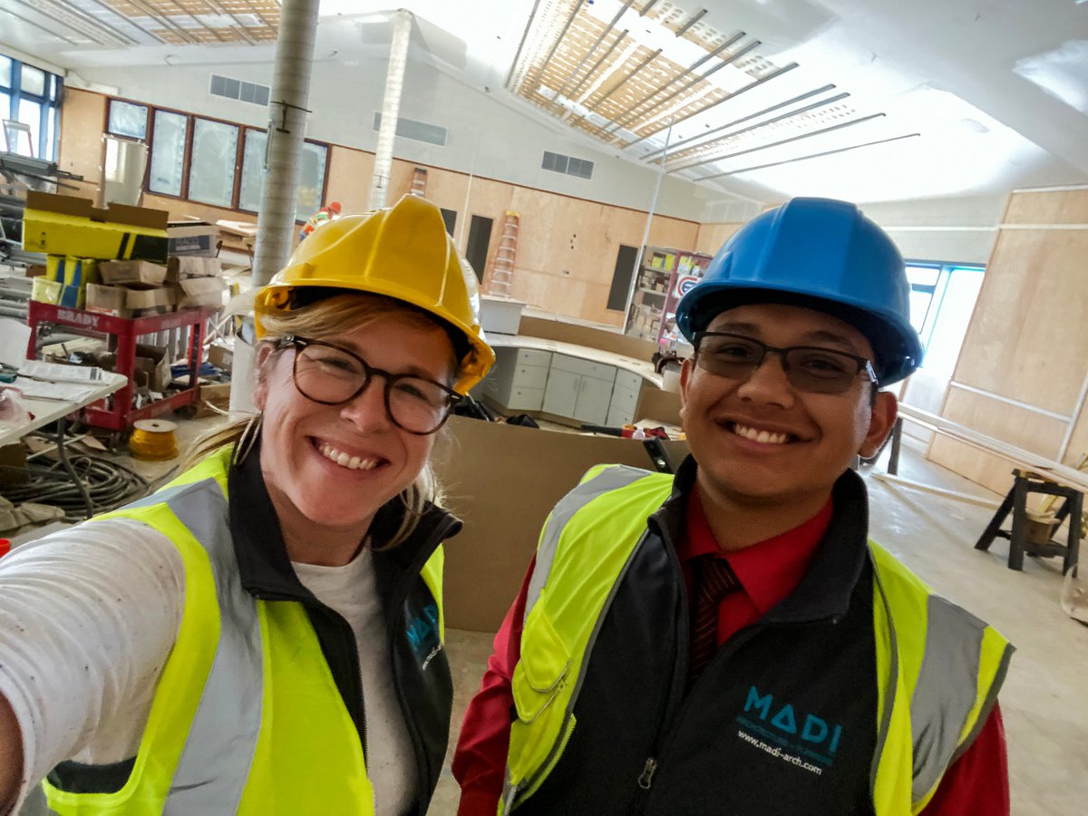 MADIGroupInc's tweet photo. The construction of Soquel High School’s library renovation is well under way! Melissa and Daniel made a site visit to check out the progress on the modernization this week. This project is a great example of the way MADI Interiors and MADI Architects team up. https://t.co/1CMfo6q04D
