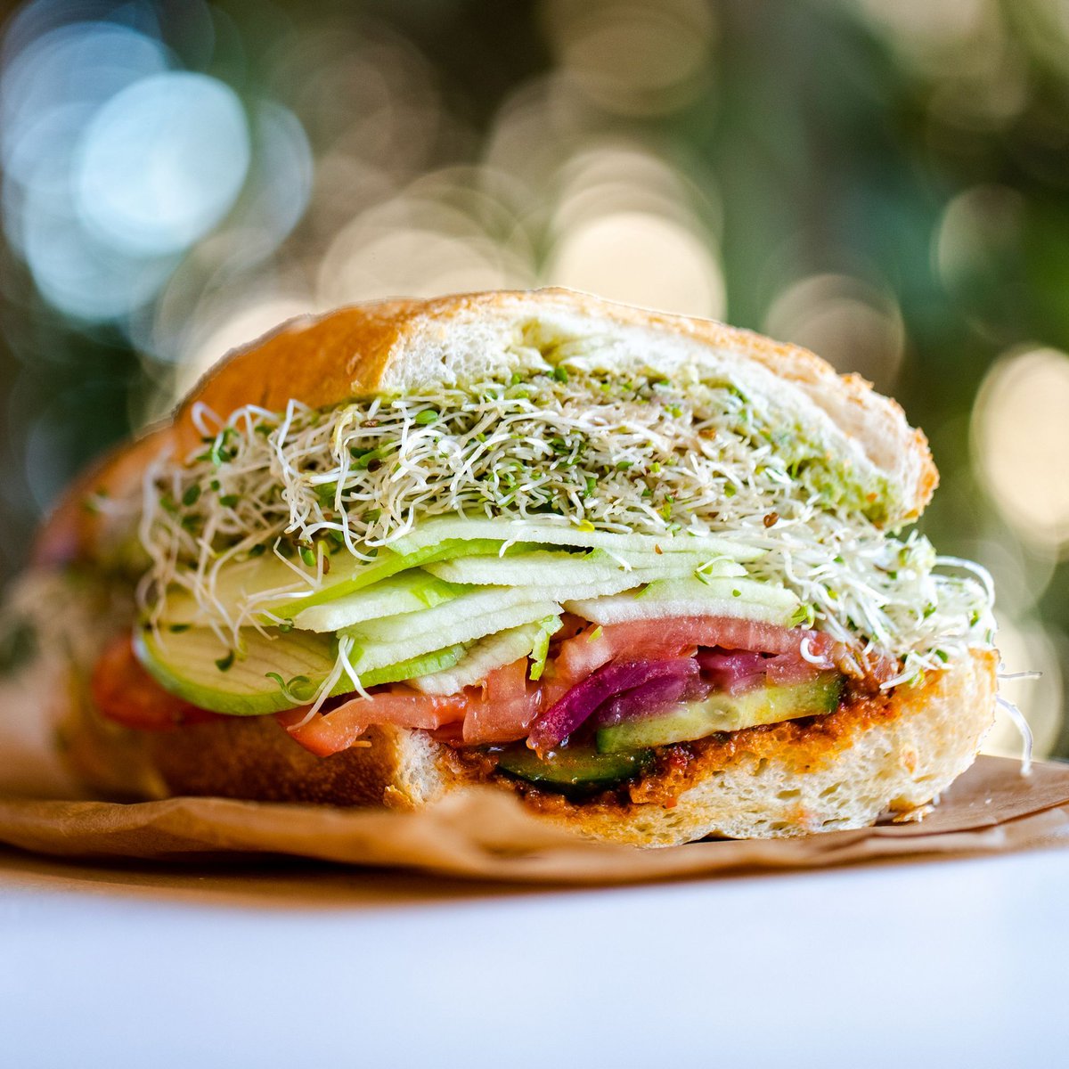 SessionsWCD's tweet photo. We call this one our Farm-to-Face. #Vegan friendly and LOADED with flavor. Seriously...it has some of the most flavor out of any of our sandwiches. Some would describe it as a vegan dance party in your mouth. But we just like to call it Farm-to-Face.

#RadicalEats https://t.co/9pHrenrveo