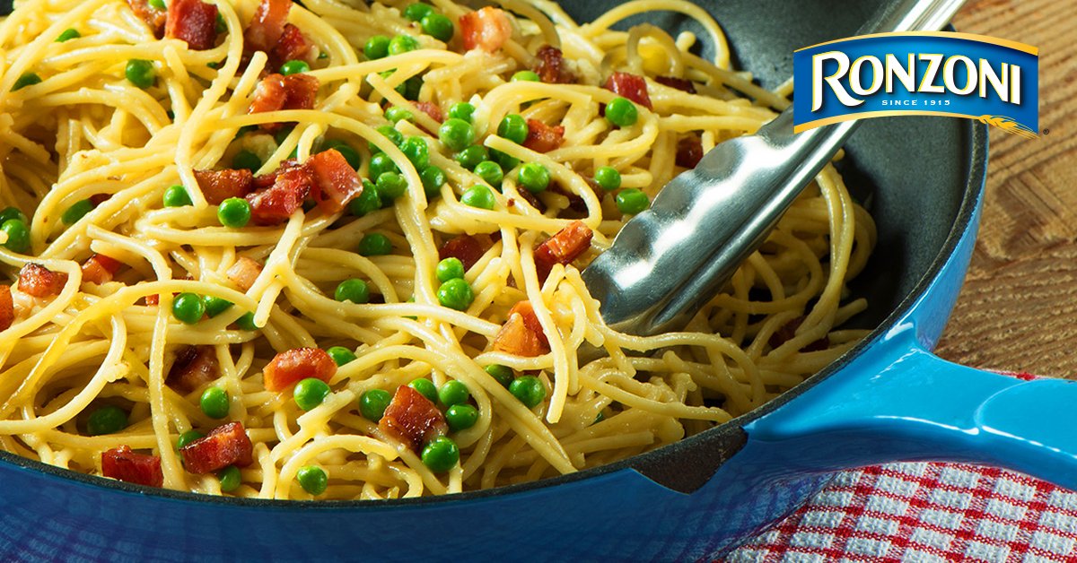 Did someone say #BaconDay? 🥓 Pay homage to your favorite meat with this #Bacon and Green Pea Carbonara recipe: bit.ly/2YXYJOa #Wefreakinlovepasta