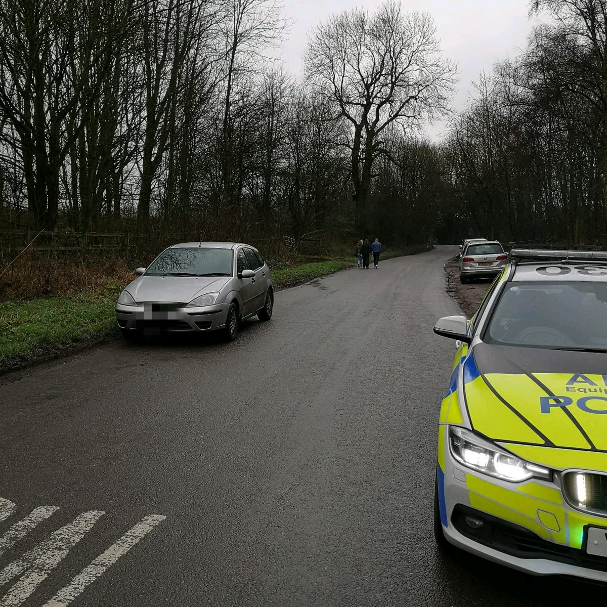 DerbyshireRPU's tweet photo. Tibshelf. The three occupants of this Focus doing the walk of shame after their car has been seized. A full house - no licence, insurance, MOT or tax but somehow expected turning down a country lane would throw us off the scent. #Seized #Traffic #Chancer https://t.co/C1zoHlLuUp
