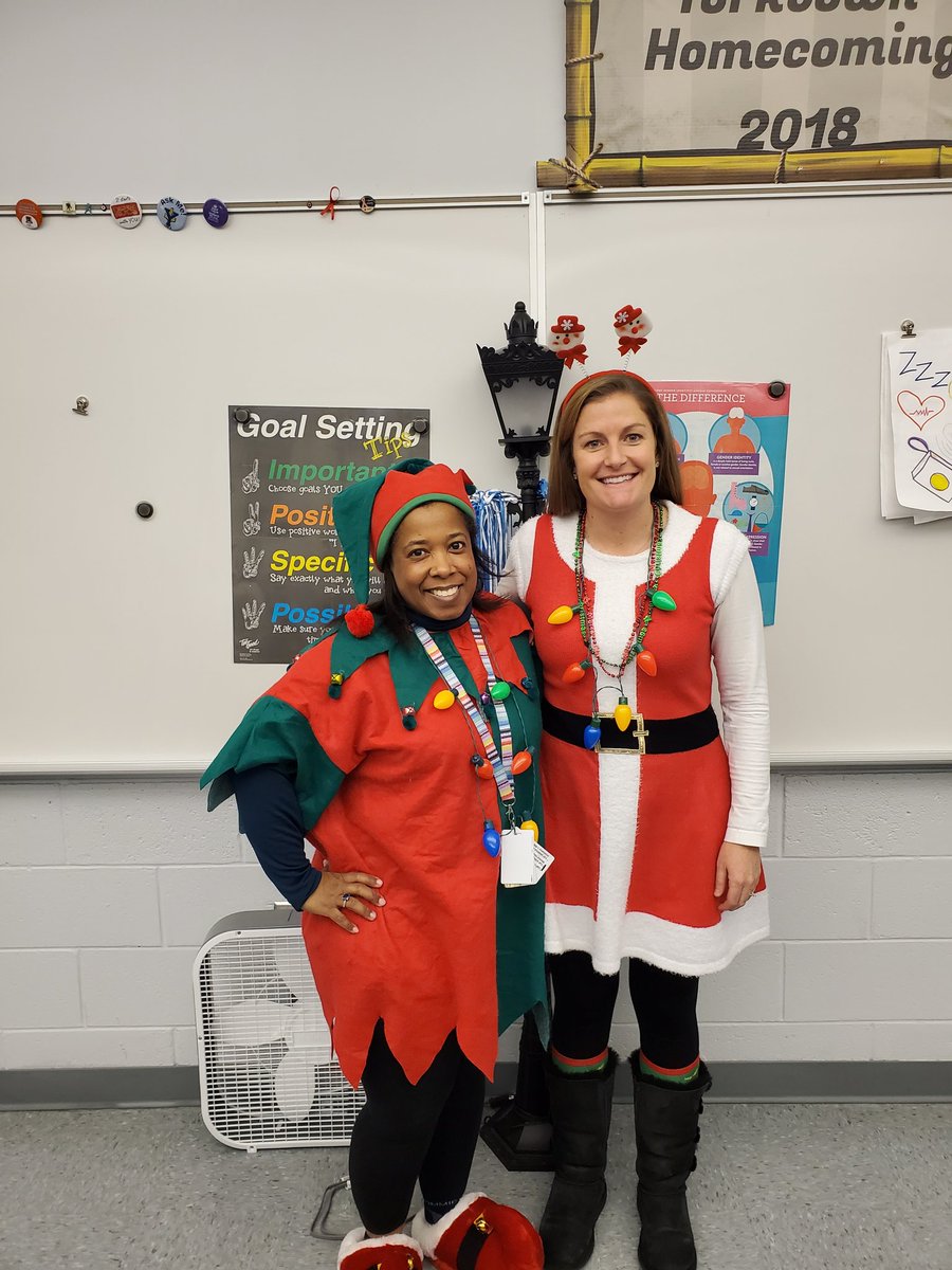 YorktownHS's tweet photo. YHS teachers Heather Sutphin and Stephanie Meadows are ready for the holidays. @YorktownHS @Principal_YHS @YorktownSentry @YorktownAPs @APSVirginia @APSHPEAthletics @APSHPE2 @HLSutphin https://t.co/PsIPQKGQj2