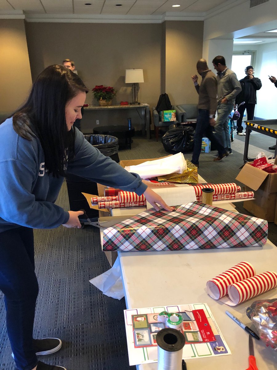 SPRichardsCo's tweet photo. Volunteering at Atlanta’s Children’s Shelter! Gift wrapping presents after parents choose gifts for their children! #sprstrong https://t.co/F3yNW53y9h