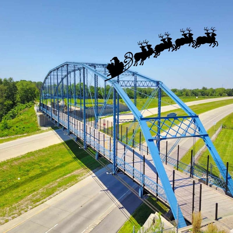INDOTNorthwest's tweet photo. #SantaStopsIN; Santa has made his way to the southern part of the district, flying over the beautiful Freedom Bridge in Delphi! Want to continue to monitor Santa's progress as he moves through Indiana? Check out @INDOTNortheast next! https://t.co/aIlgl69ZLk
