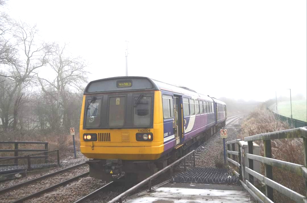 Northern_Travel's tweet image. Former, bounce, screech, thud, wallop, clunk, boing, Northern #Railbus 142001, is seen passing through Newton Aycliffe station this afternoon, enroute to its new life at @railwaymuseum Shildon.

© Matthew Jimmison