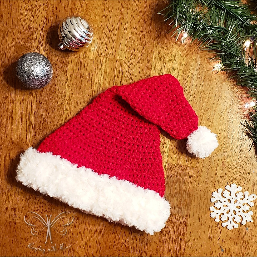 LoopingWithLove's tweet image. When your daughter has Holiday Festive Headwear Day @ school the following day, you take her request at bedtime to make a Santa/elf hat, &amp;amp; run with it late into the night. Should I type up this child sized hat &amp;amp; put it on the blog?#crochet #santahat #elfhat #ooak #loopingwithlove