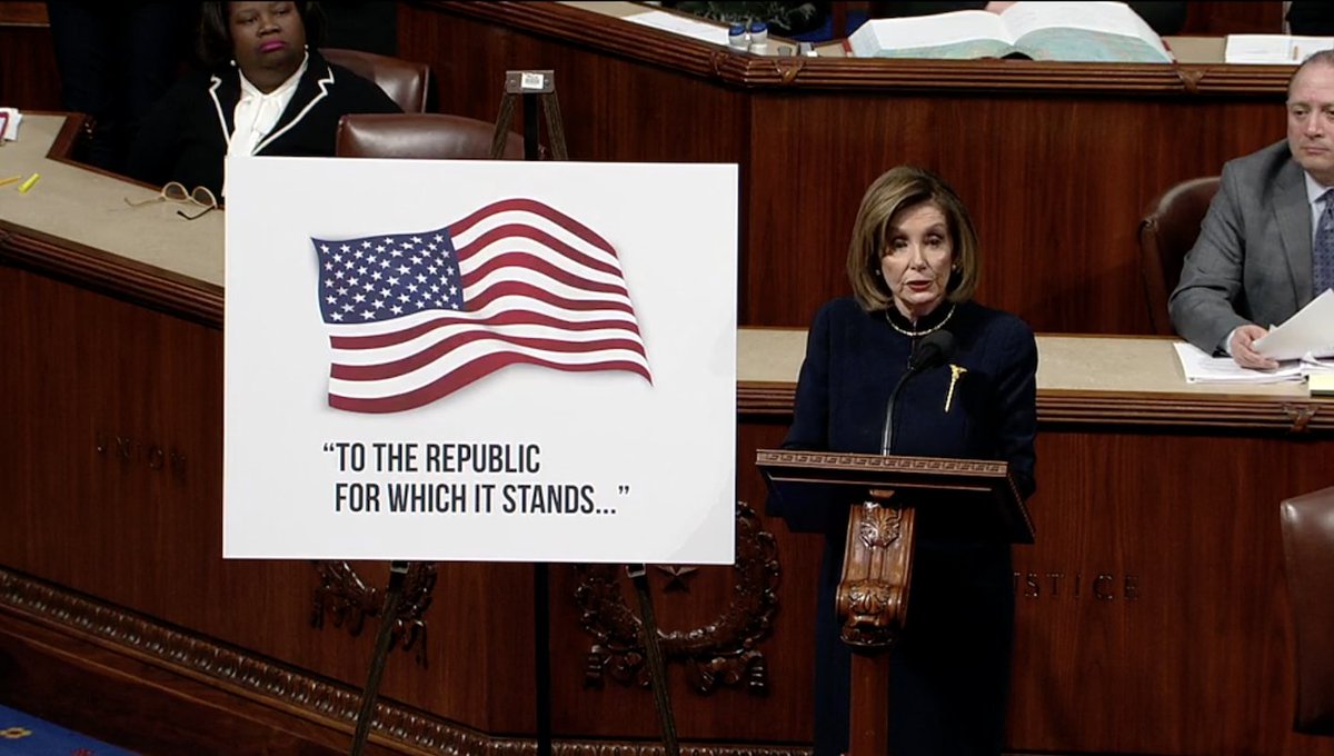 Speaker Nancy Pelosi speaks on the House floor during the impeachment debate. She is standing next to a sign that has an American flag and text that reads "to the republic, for which is stands..."