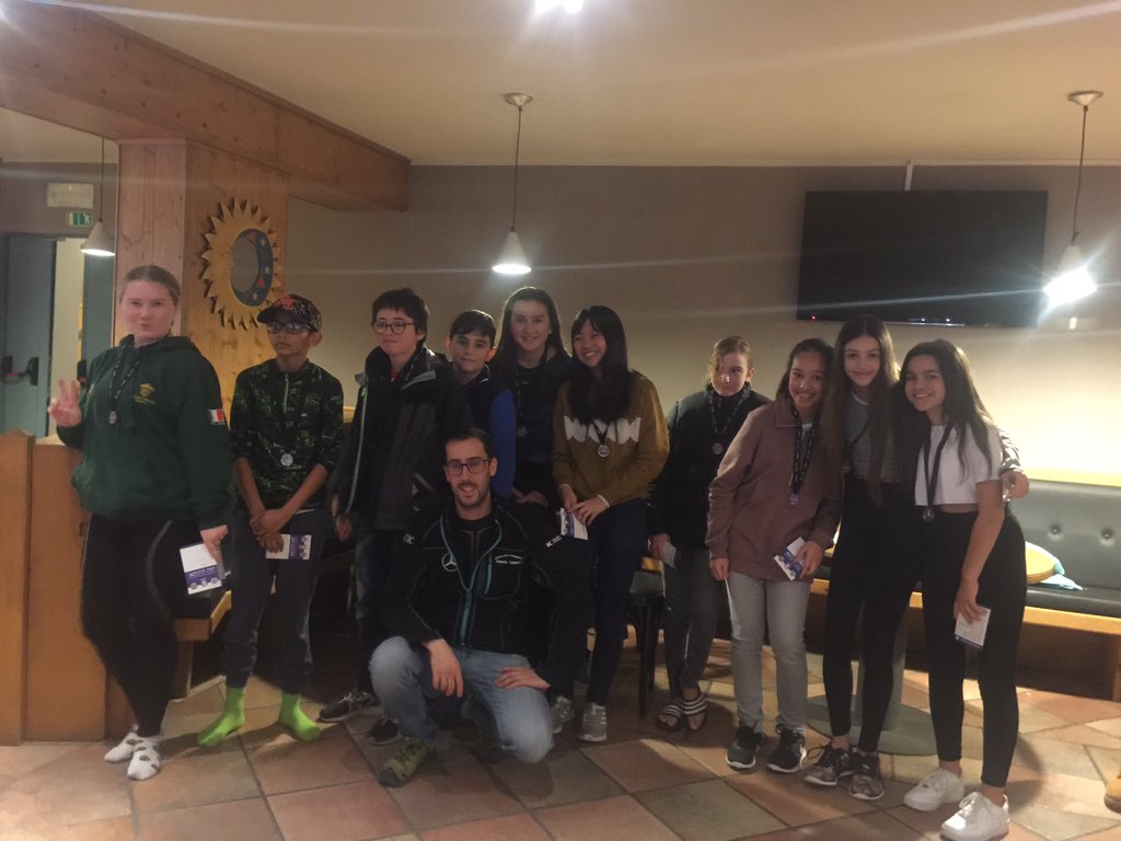 Intermediate group are receiving the ski certificates and medals