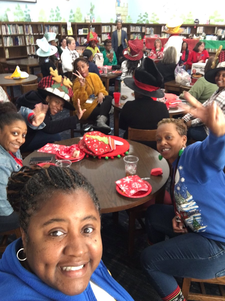 lhwhite74's tweet photo. Holiday hats and food @OKE_HCS. We had lots of fun during our white elephant party. https://t.co/kk37bEofP8