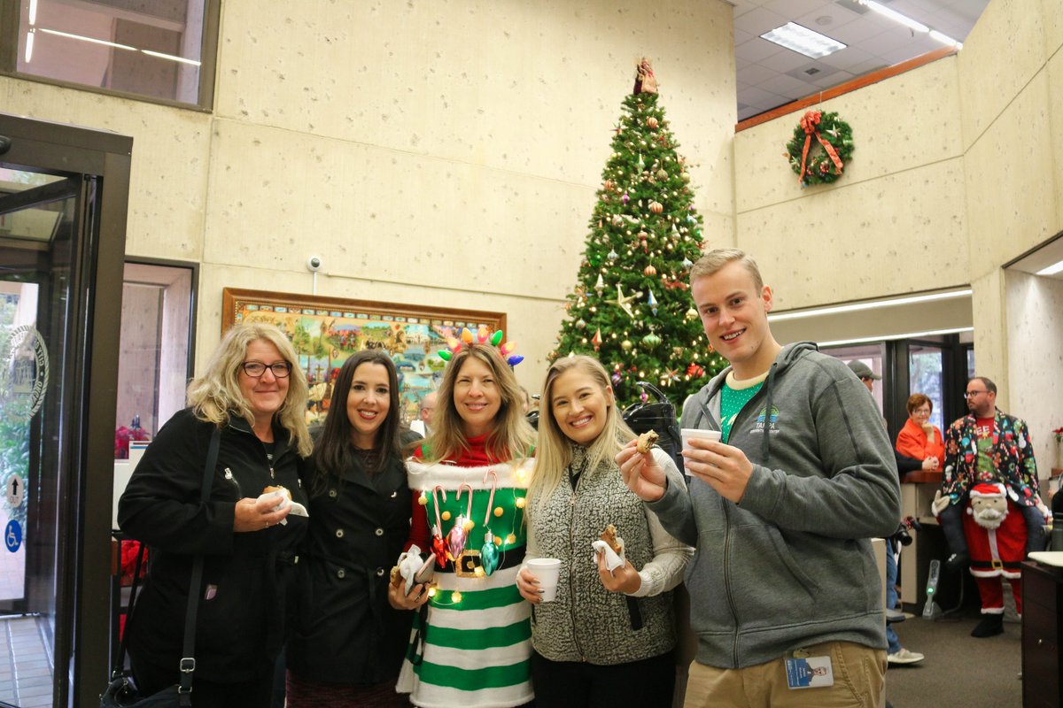 CityofTampa's tweet photo. Today our employees put on their holiday best for our Ugly Sweater Contest! We want to give a big THANK YOU to @bakenbabes for the delicious cookies, Hemingway's for the Nutella hot chocolate, and @empamamas &amp; @bigraysfishcamp for providing the prizes! https://t.co/6GlGzR2GyY