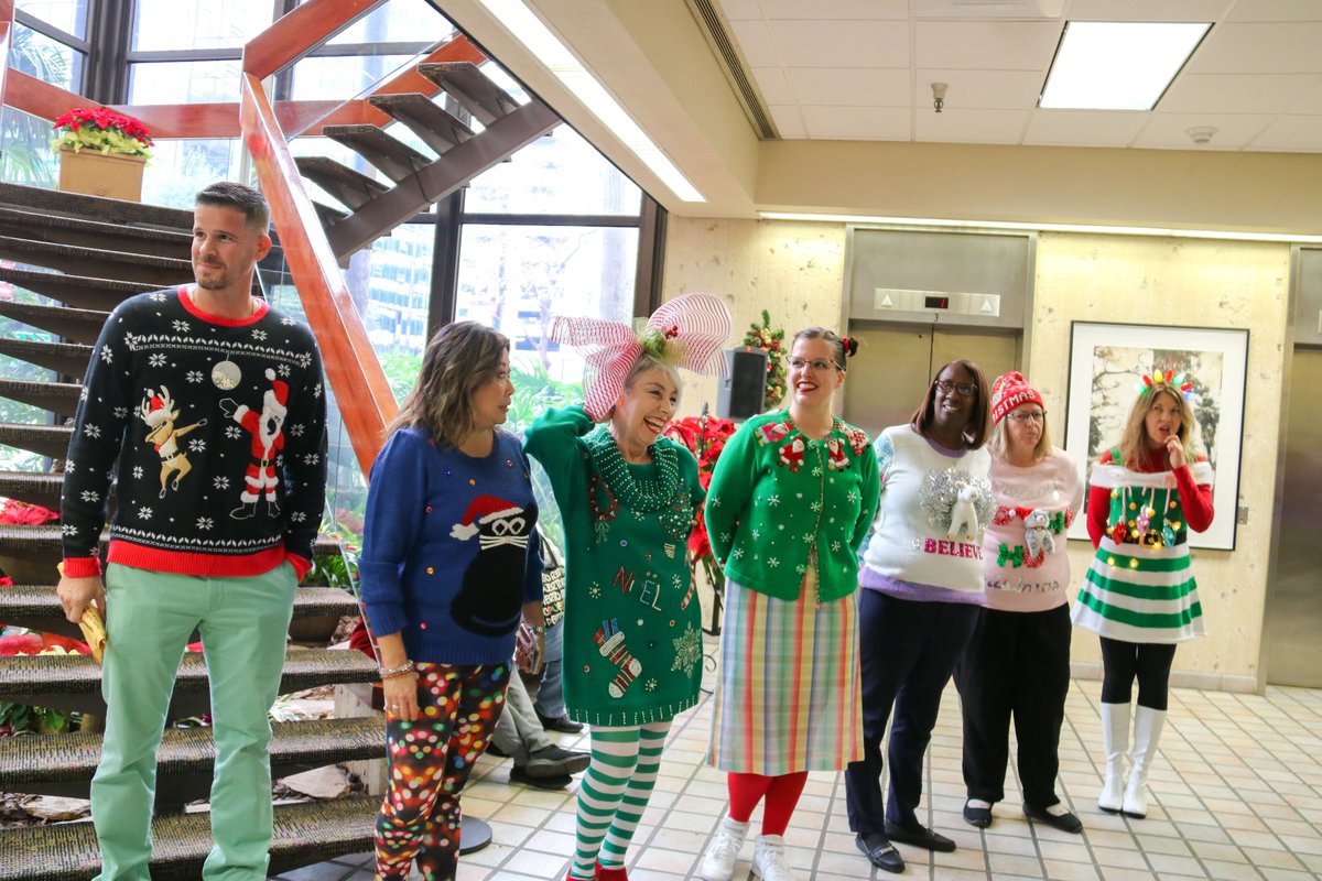CityofTampa's tweet photo. Today our employees put on their holiday best for our Ugly Sweater Contest! We want to give a big THANK YOU to @bakenbabes for the delicious cookies, Hemingway's for the Nutella hot chocolate, and @empamamas &amp; @bigraysfishcamp for providing the prizes! https://t.co/6GlGzR2GyY
