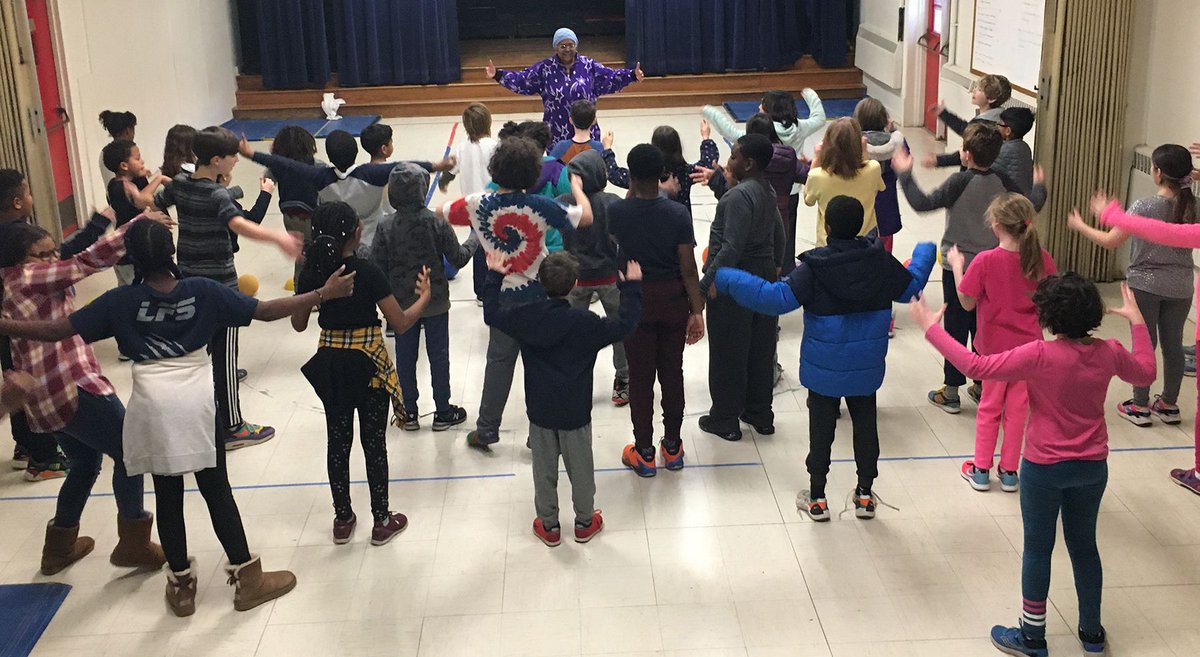 LFS1902's tweet photo. Rehearsing for Friday's Community Sing, 3rd through 6th graders, learn the motions and words to Tr. Andrea's Hawaiian version of The Twelve Days of Christmas. #lfseducation #lfsculturalawareness https://t.co/pNOg3pT2lE