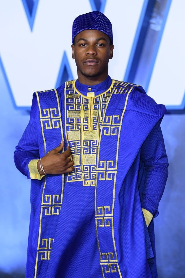 DionneGrant's tweet photo. John Boyega and his family attend the European premiere of ‘Star Wars: The Rise of Skywalker’ in traditional clothing 💙 https://t.co/GqwtICJq46