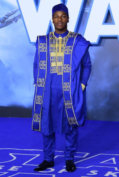 DionneGrant's tweet photo. John Boyega and his family attend the European premiere of ‘Star Wars: The Rise of Skywalker’ in traditional clothing 💙 https://t.co/GqwtICJq46