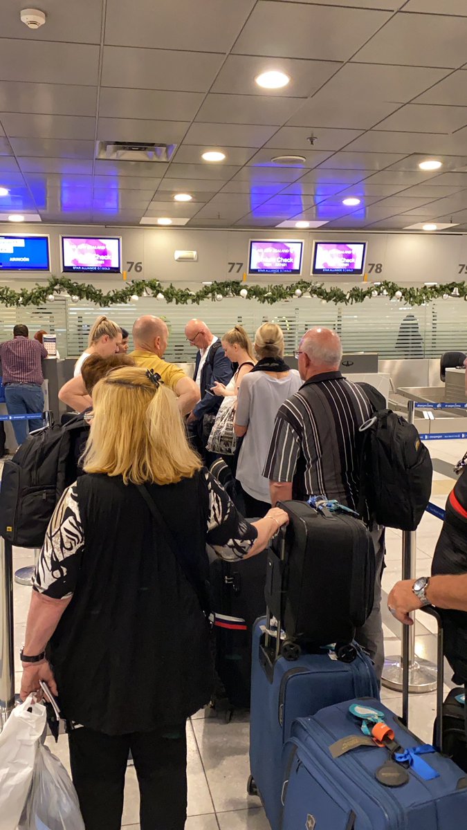 robdedom's tweet photo. @FlyAirNZ come on. Check us in ?  Why are they back in the office having a chat? https://t.co/Lbjqr08OdW