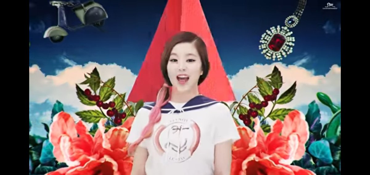 7.2. is standing behind that big pink pyramid. So if the pyramids built by the Egyptian symbolizes power, it means that Irene has a power.