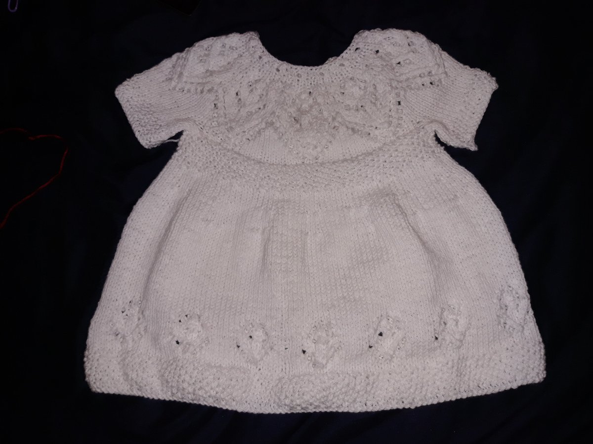 KnitFlick's tweet photo. #HandKnit #Knitting Finished this white dress from the Rosie Dress pattern on Ravelry. It's for a 3-6mo. https://t.co/Odxz1Sx0Dv