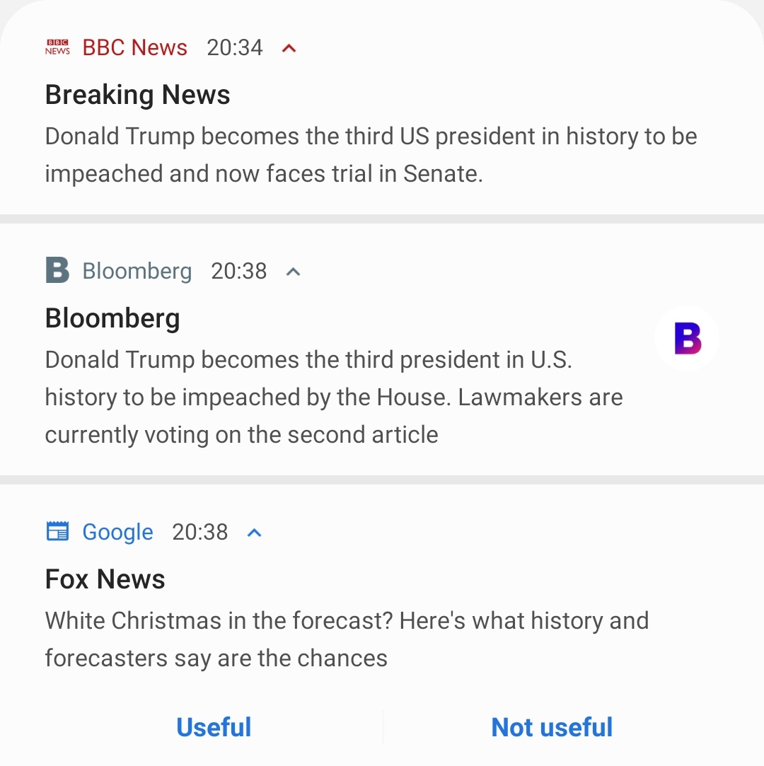 Two breaking news notifications, one from BBC News and one from Bloomberg, about Donald Trump becoming the third US president to be impeached, and a third notification from Google linking to a Fox News article about the odds of a white Christmas.