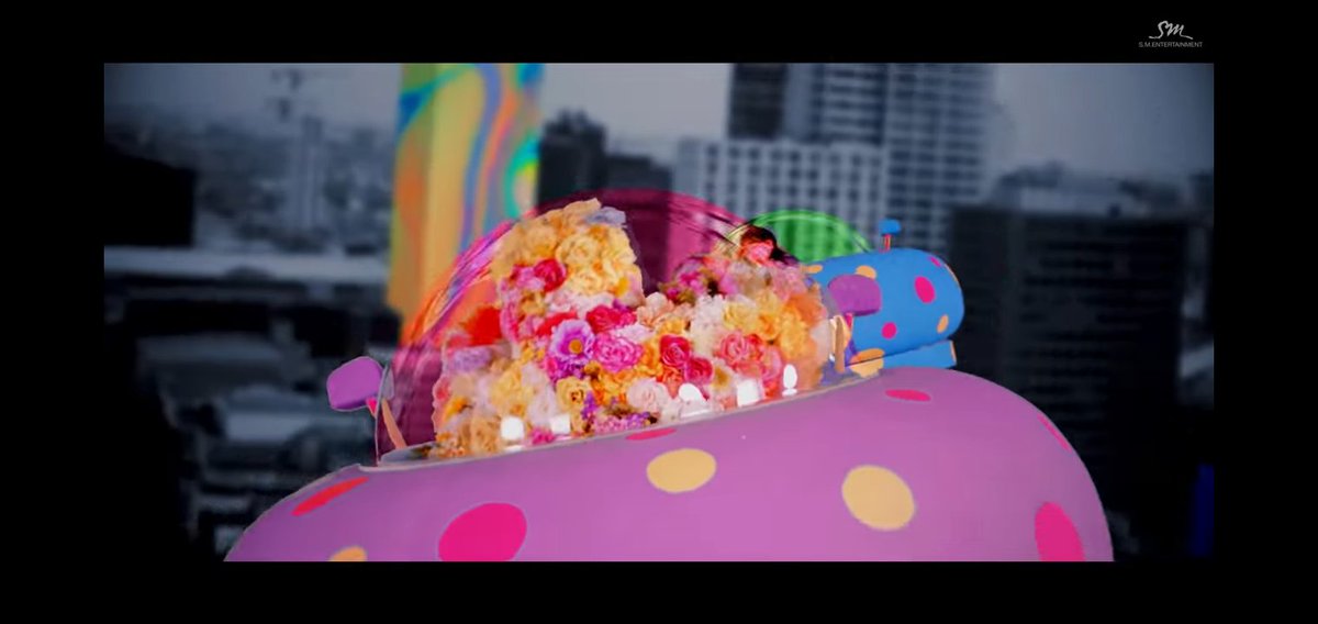 31. Here in this scene, the flower monster is riding a "pink" spaceship while chasing the girls. And again pink is Irene's power. Means that the monster is controlled by Irene.