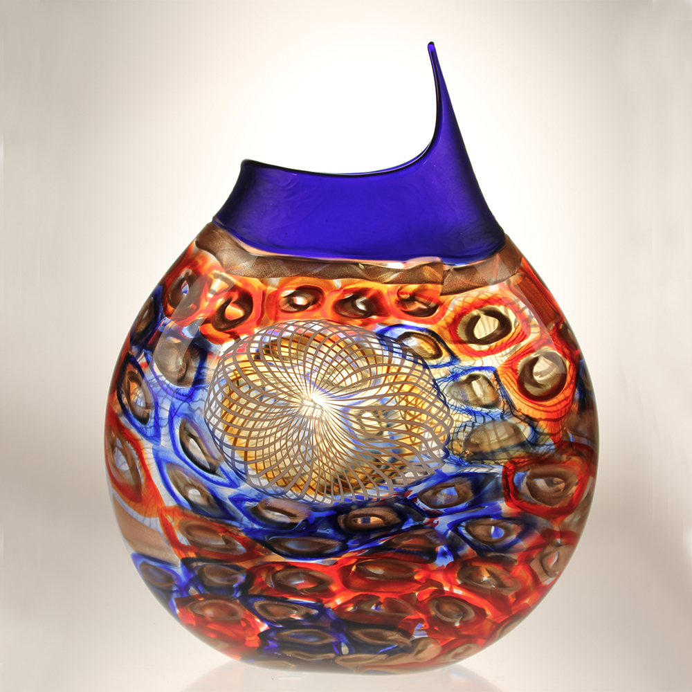 boha_art
‘Fiamme 26’ by Gianluca Vidal

This Murano art glass vase echoes the Murano tradition of murrrhine’s, here, “tutti murrine’. Vibrant colours of cobalt, red, white and black all call out.

#bohaglass #gianlucavidal #Murano #glassart #glassvase #muranovase #boha_art