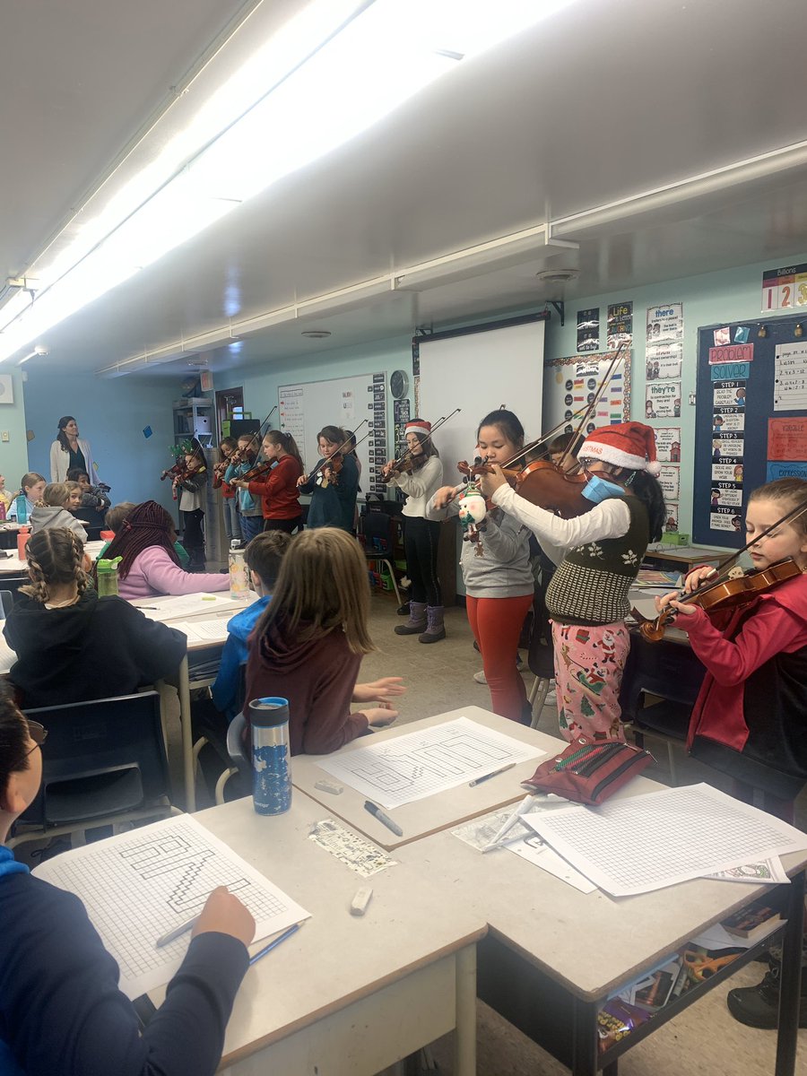 Ms_MacKenzie8's tweet photo. Yesterday we had some visitors to our classroom, including 3 of our own!! So nice for free kiddos to get to share their talent with their peers! Great work guys! #grade5violin #christmascarols #keepupthegreatwork @basinviewdrive https://t.co/hooqkSkdSU
