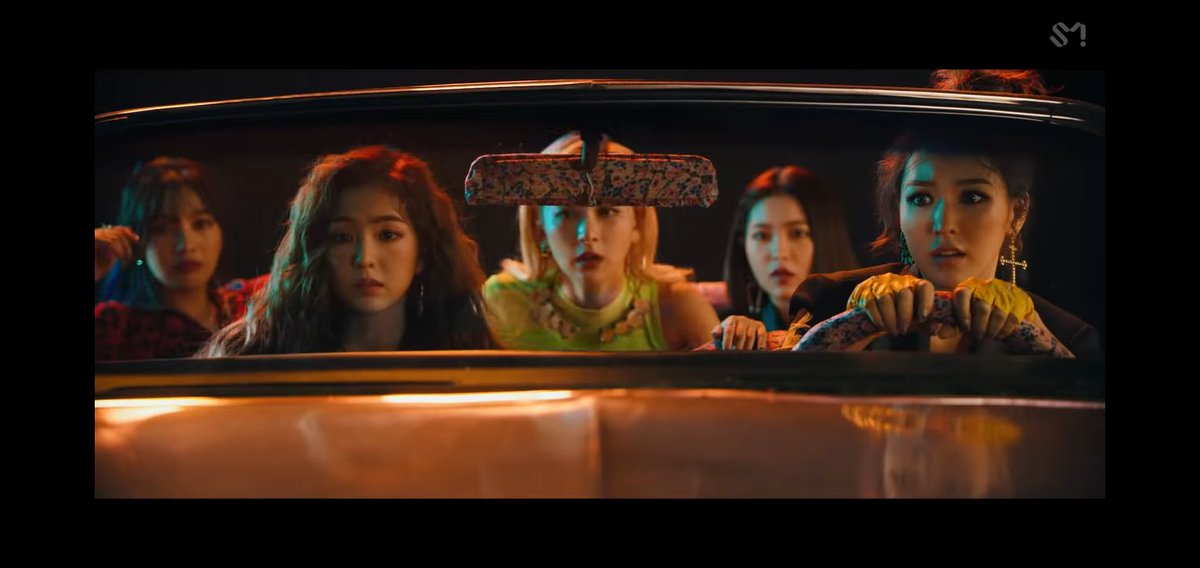 65.1. While Seulgi is busy fighting Irene. Wendy on the other hand also moves by first, not letting Irene handle the steering wheel. Meaning she doesn't want to give the controls to her. Actually this is the first time that Irene not handling the steering wheel.