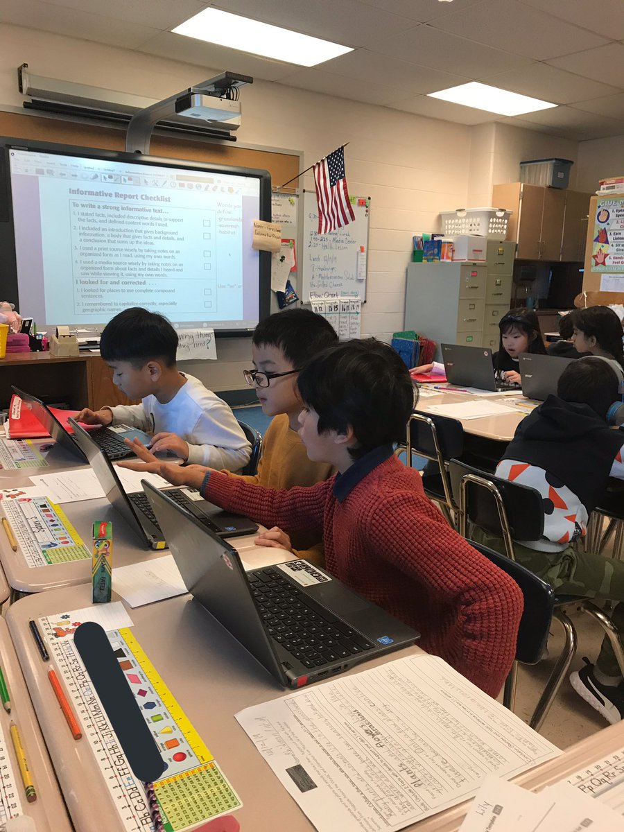 Grade 2 students peer editing their informative writing- working right up until winter break! ❄️<a href="/BenchmarkEdu/">Benchmark Education</a>