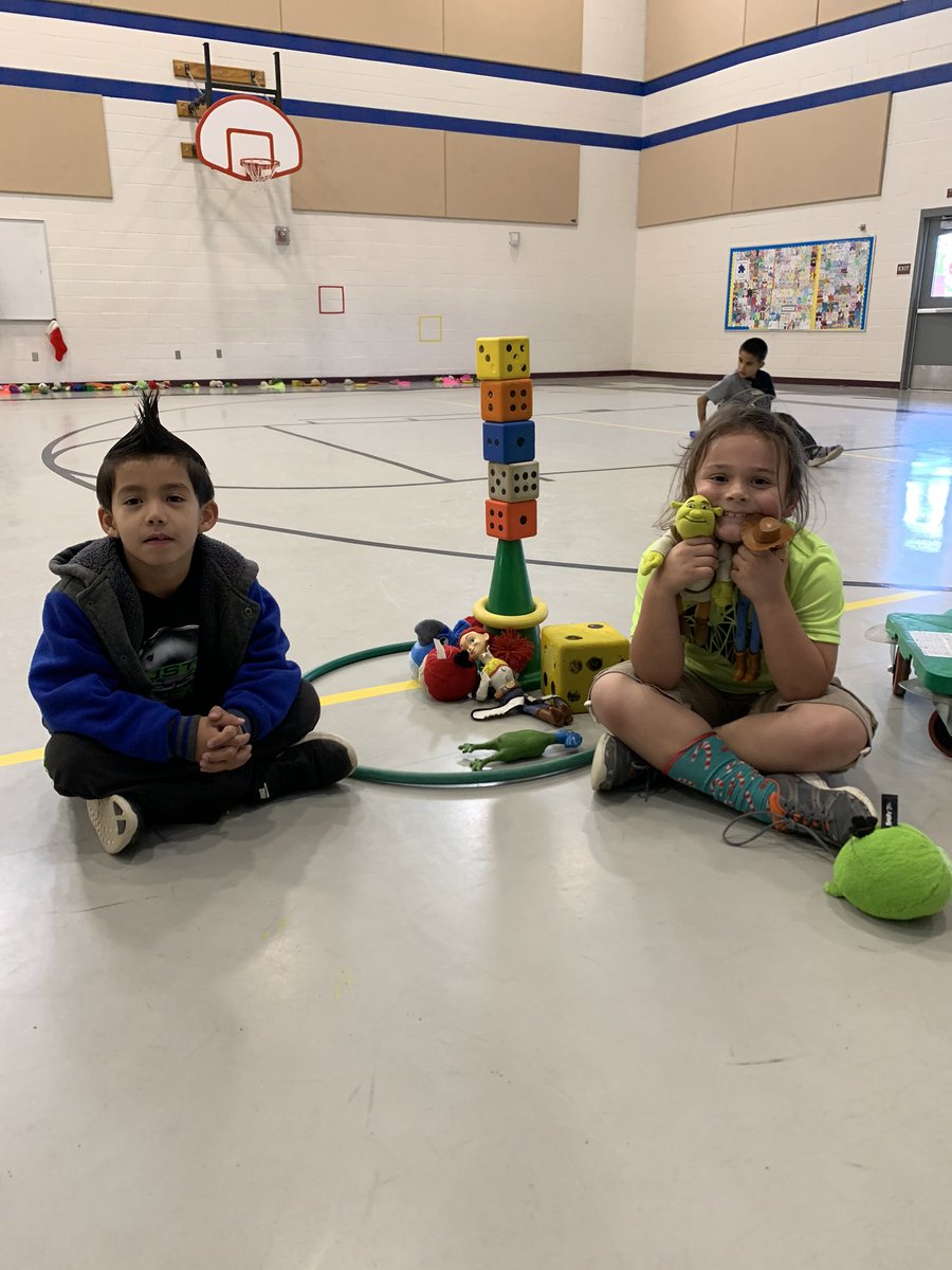 VillagePe's tweet photo. Look at these kiddos rescuing all of toys from the Grinch and decorating their house in Who-Ville @Village_Meadows https://t.co/5S7aphxZvX