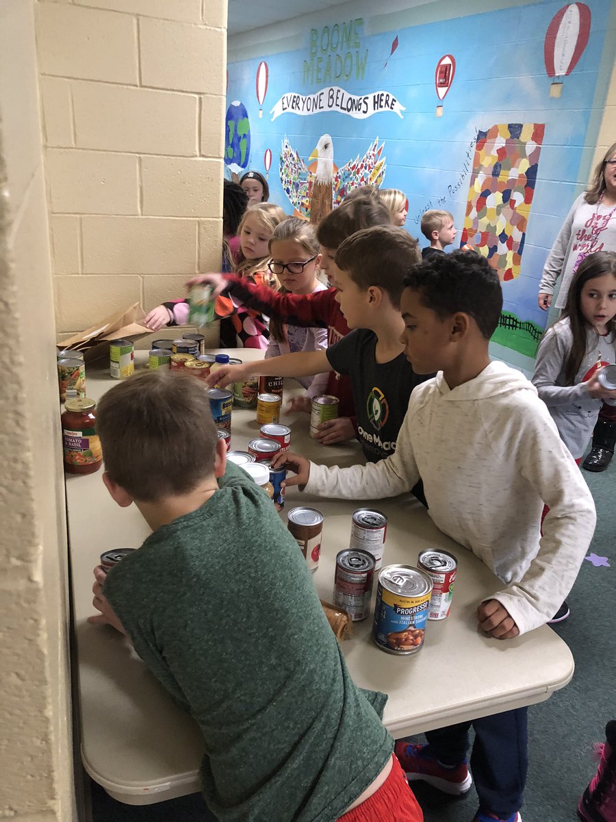 JonannLamaster's tweet photo. The food drive was a huge success!  These 2nd graders collected, sorted, and counted all the food items...over 600 items collected!  Later today, some of them are even helping us take them to the Caring Center ❤️ 
@miss_kiel @ZCSBoone_Meadow https://t.co/DbnX9vFZax
