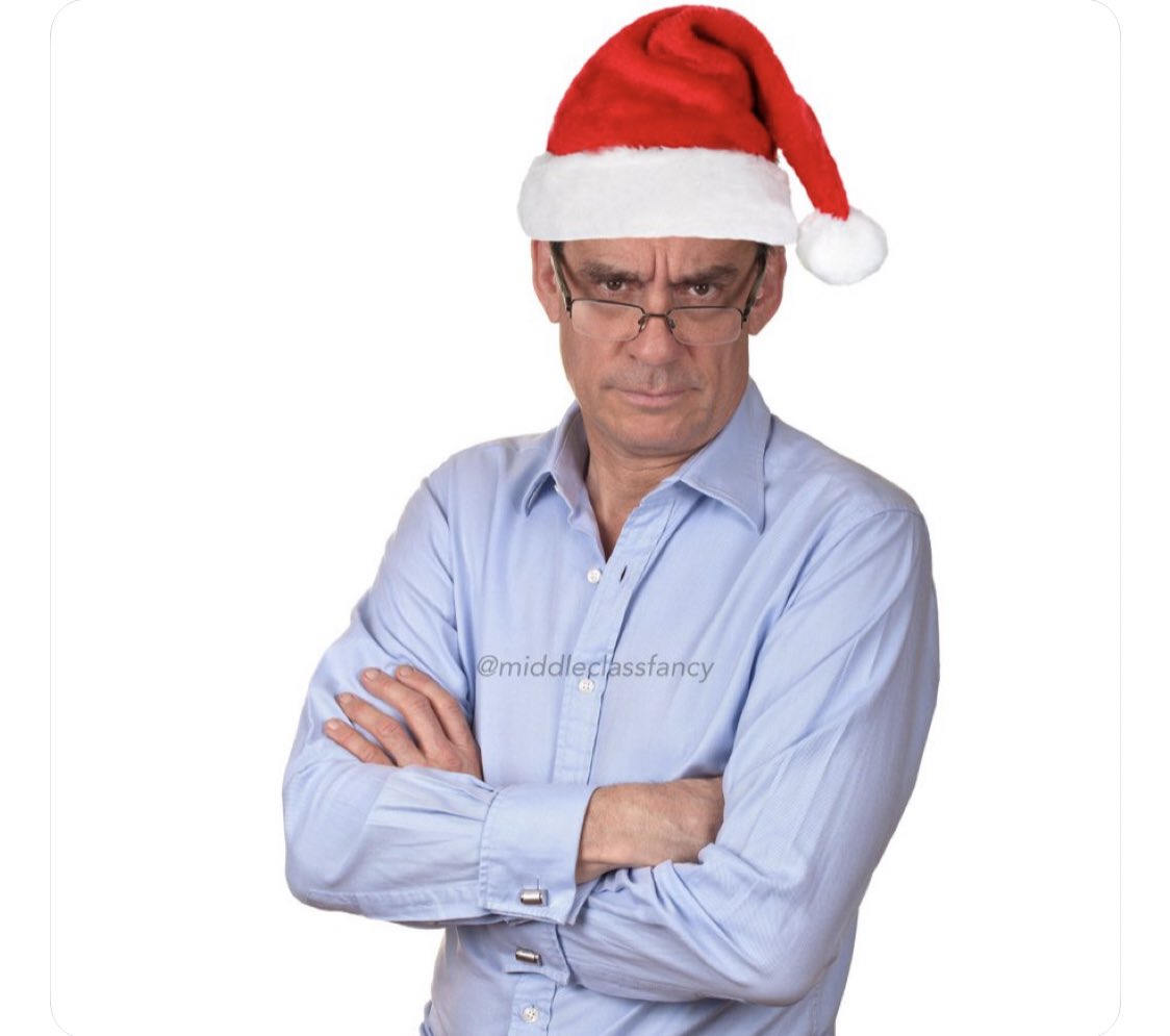 When Nance makes you wear a silly Santa hat for Christmas card pictures