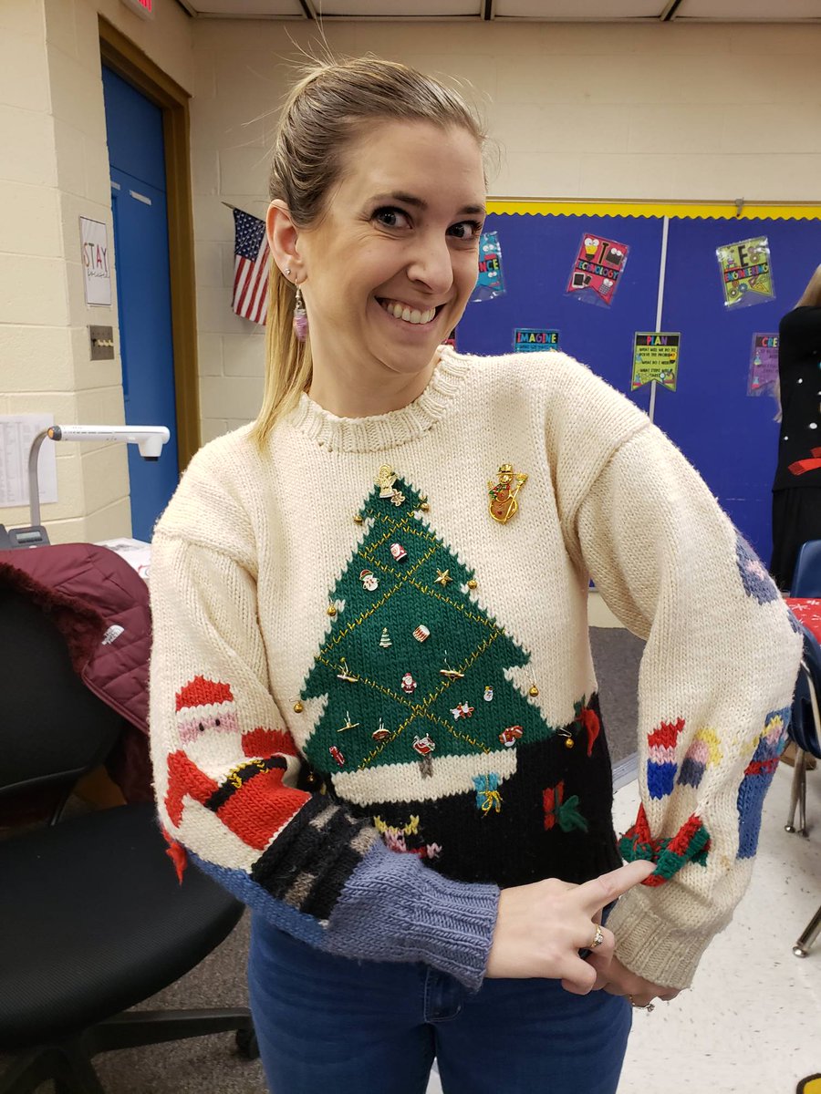 Congratulations to Ms. Tarpley, the winner of our tacky sweater contest!  Meow!  Pictured are a fee favorites!
