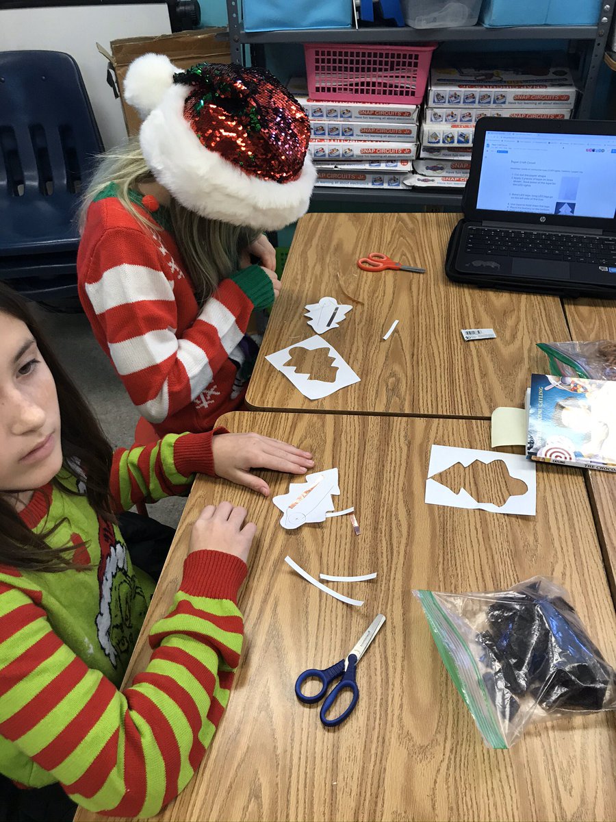 AshMihelic's tweet photo. Paper Christmas tree circuits!!Thank you @mmthomps @DurkinAnnemarie for a such a fun way to learn problem solving and electricity! @em__lyons @MrsJones33 @cziggy1 @JoshRingling @SarahPayneNBCT #WeareTgood https://t.co/ANcPJiRCw9