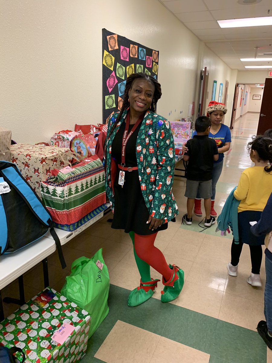 TheomaneD's tweet photo. The staff of Barton as they spread the joy of the holiday season with every child. @BartonChargers @nancyreesefl @hainesv @pbcsd https://t.co/aA6Mu9ttpb