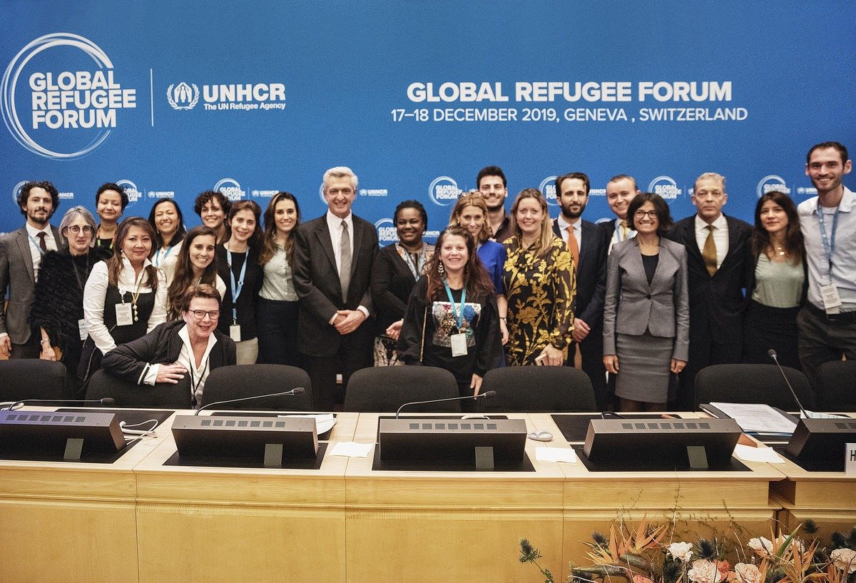 patrickcjwall's tweet photo. The team with the big boss after the close of the Global #RefugeeForum last night https://t.co/iqPHTQ8Co0