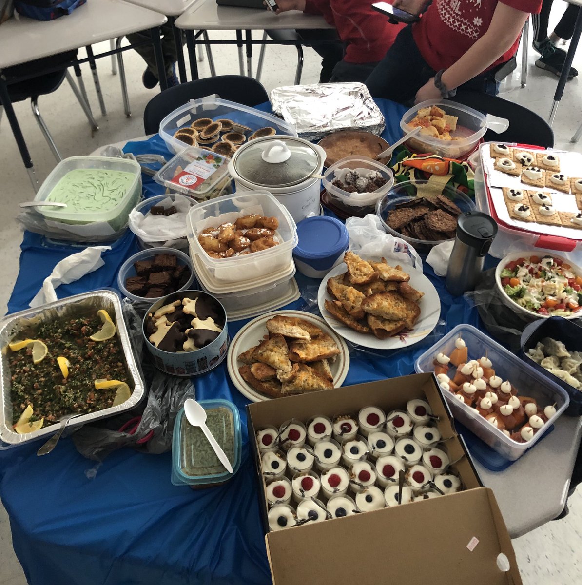 MrsHoll7's tweet photo. A Christmas holiday lunch🎄 Sharing our holiday traditions and cultures! @StPaulOCSB #PeerHelpers https://t.co/c3iePdUsqx