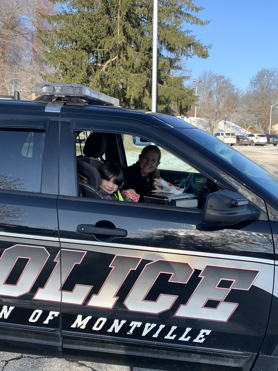 Jordy won a ride to school with Officer Aleshire!