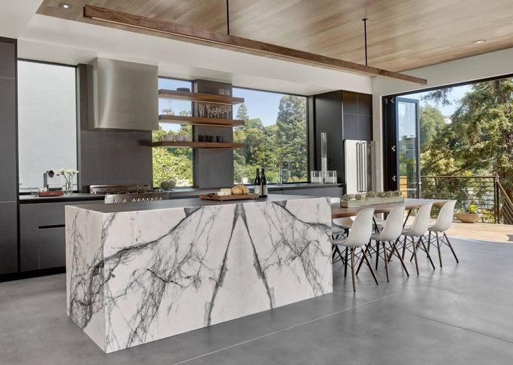 ATX_Homes's tweet photo. Marble island and dining area that opens to the outdoor area 😍 #ATXHomes #atx #austintexas #austinrealtor https://t.co/7bQ2nCbbra