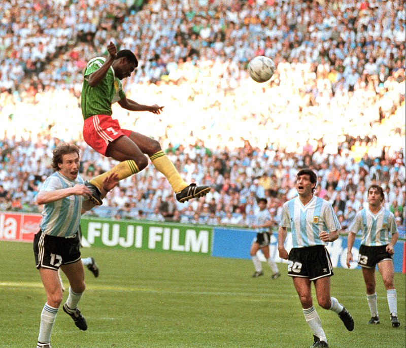 DhakabaKigongo's tweet photo. Hello everyone from teh Messi v Ronaldo fan clubs.... 

Every time I listen to you debate, you sound like everything they r doing is new

However, that header/leap last night is a rendition from François_Omam-Biyik v Argentina 29 years ago https://t.co/BErBbRkVO8