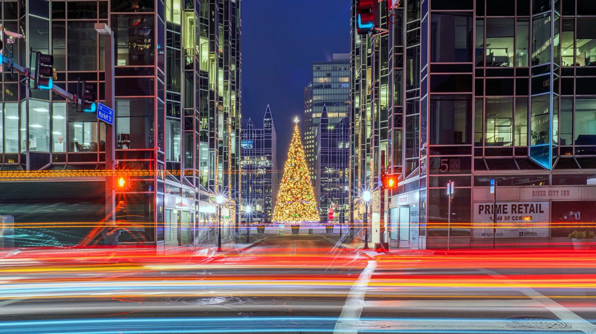 DaveDiCello's tweet image. This is one of those unexpected shots that turned out better than the one I was trying to create. I was capturing the Christmas tree at PPG Place in #Pittsburgh from across the Boulevard when a truck drove by which, along with the light trails from cars, perfectly framed the tree