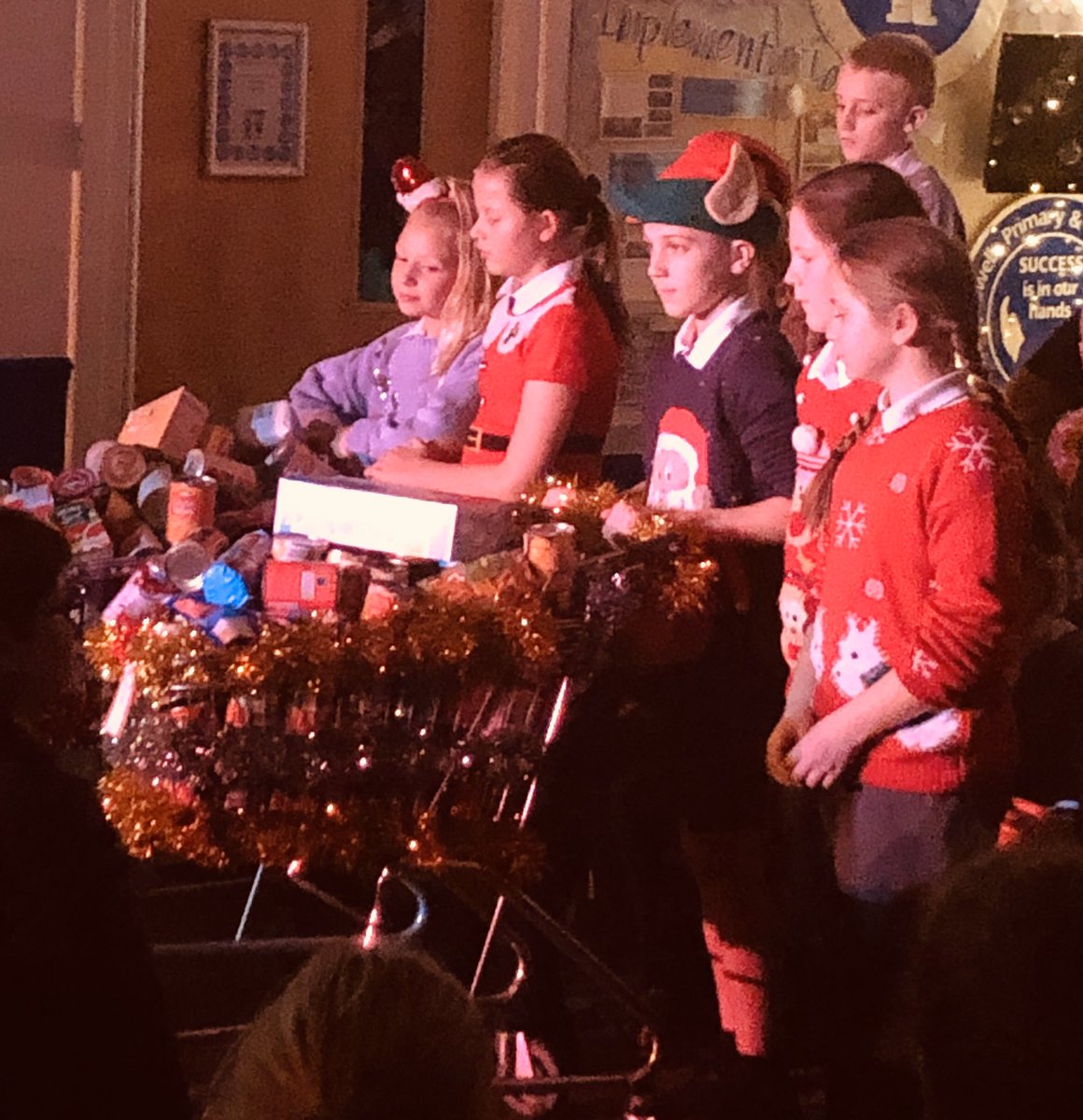 MapplewellsPrim's tweet photo. What a fantastic and memorable Year 6 Christmas Carol Service, with a mixture of traditional and modern twists!! Thank you for all your kind donations for our ‘tins not tinsel’ campaign🎄🎅🏻 @FlyingHighTrust #community #FlyTogether #Mapplewellians #SUCCESS #Christmas #kindness https://t.co/l7qHqeisam