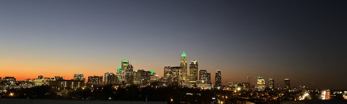 meagan_conley's tweet photo. Skyline tonight! Buffalo is going to be GREEN with envy when we stake our claim and take home a bowl-game win tomorrow 💚 #bahamasbowl #charlotte49ers #clublit @CharlotteFTBL https://t.co/Mj846f1ezO
