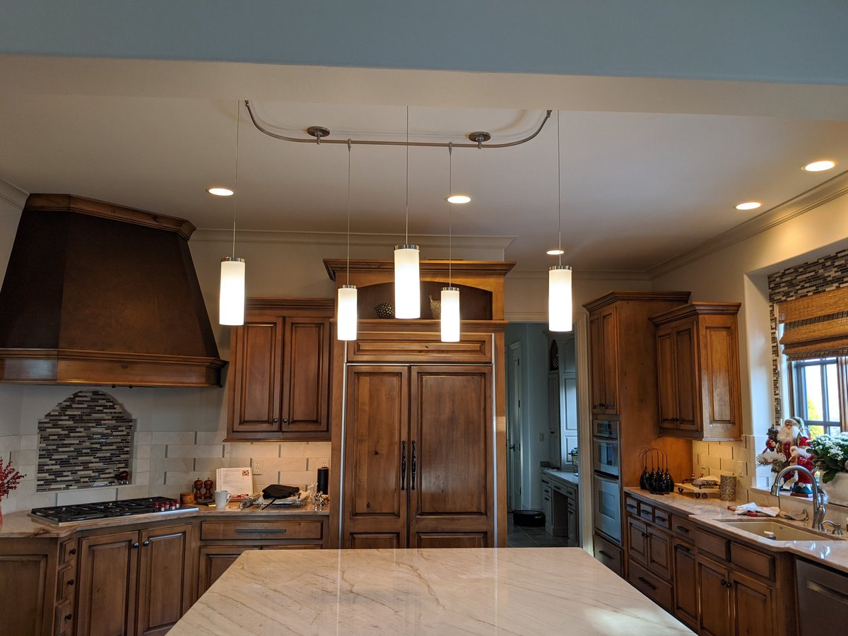 lukeborn's tweet photo. Went to hang a fixture and it showed using a pipe bender to make the corners but the customer wanted bigger corners so I decided to wrap the track around my fish tape instead.  I think it turned out pretty good. What say you? #electricianlife #fixtures #lights #lighting https://t.co/BYZjFzlq14