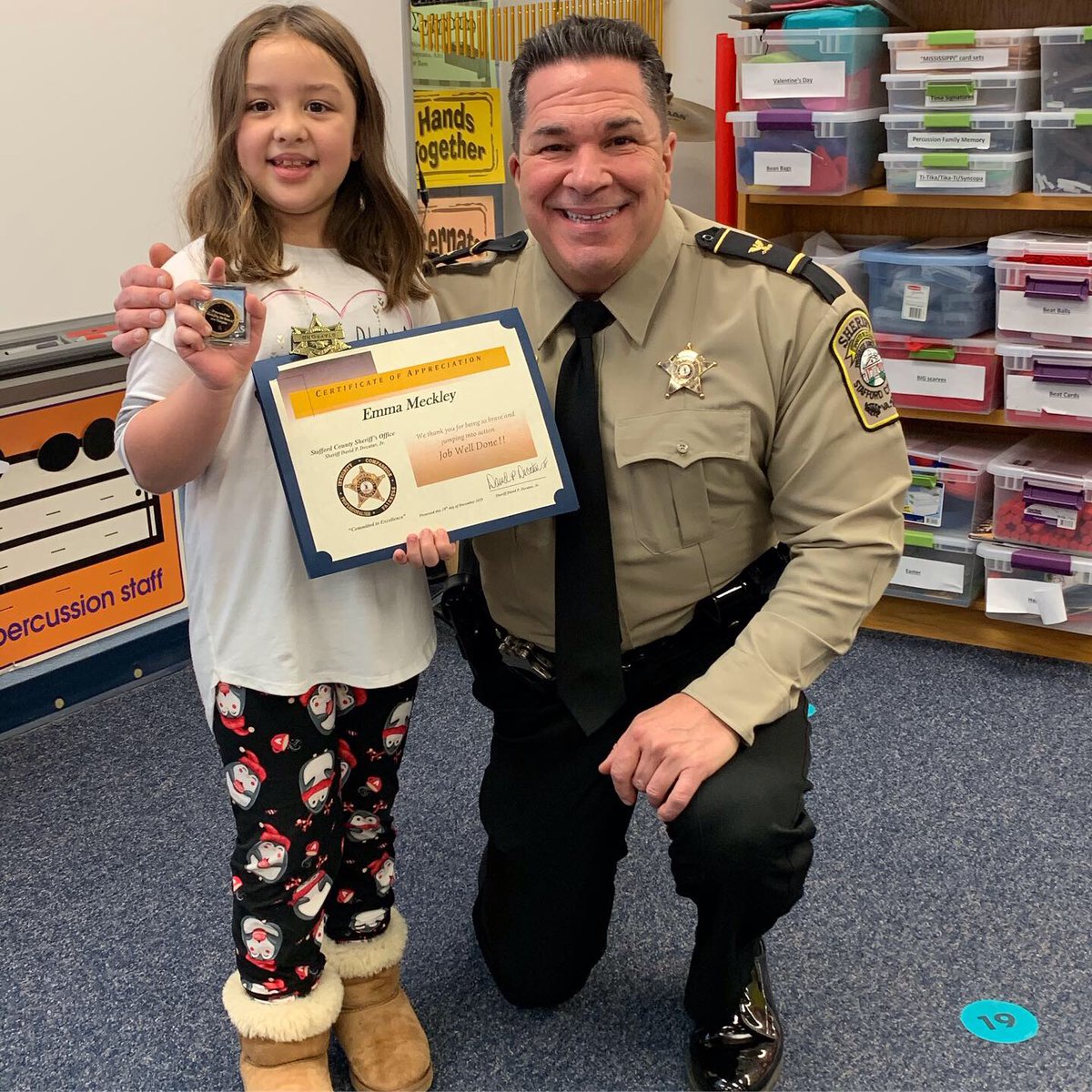 staffcosheriff's tweet photo. Today, Sheriff Decatur recognized @conwayelemsch student, Emma, for recently helping save her dad's life when he experienced a medical emergency while driving. Emma is truly a #ConwayLeader! Read more here: https://t.co/5xEqc9nsQy @SCPSchools https://t.co/GpRXvXi4Cm