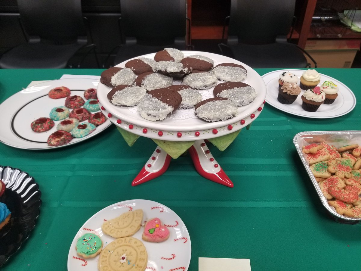 BlueJaybee1025's tweet photo. Guess who won the company Christmas Cookie Bake Off today???  ME..for my chocolate sugar cookies!!  I think my @department56 cake plate gave me bonus points for appearance😊
#CorporateFun
#ChristmasCookies
#BBVAUSA https://t.co/04gqDJC1L2