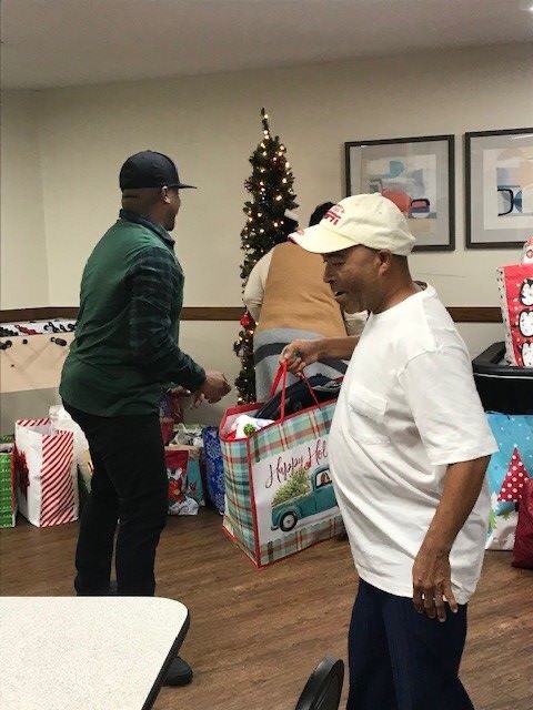 SamHouseTC's tweet photo. 'Tis the season to spread joy! ❤️

Our SRO residents were overjoyed to receive Christmas gifts from our generous donors and friends at @NTX_Market! Thank you for helping make this an unforgettable Christmas at Samaritan House!

#SamHouseIsHome
#WeAreGrateful  
#CommunityPartners https://t.co/wp3UJNSoZG