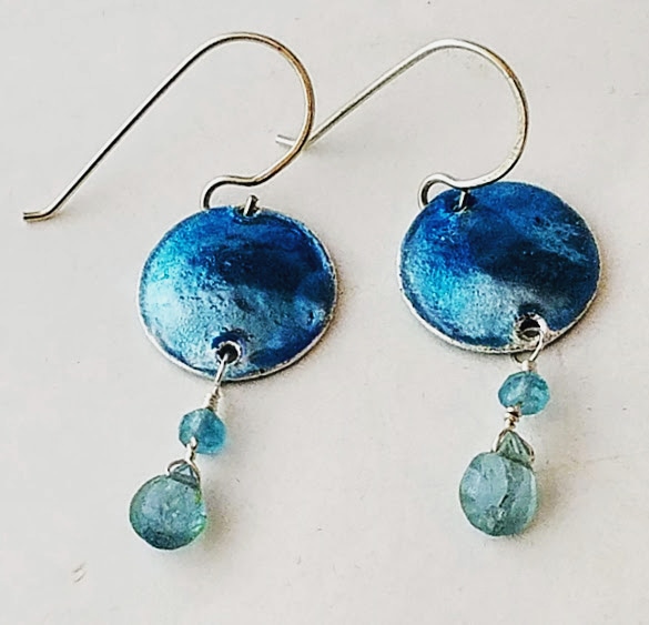 minerockstudio's tweet photo. Just a simple silver disc with a beaded dangle, but the shine is the thing!  The wonderful Ninomiya blues go so beautifully with the aqua and apatite beads.  Just added to @camelot_gallery for Christmas. https://t.co/R5vMiCZP3Q