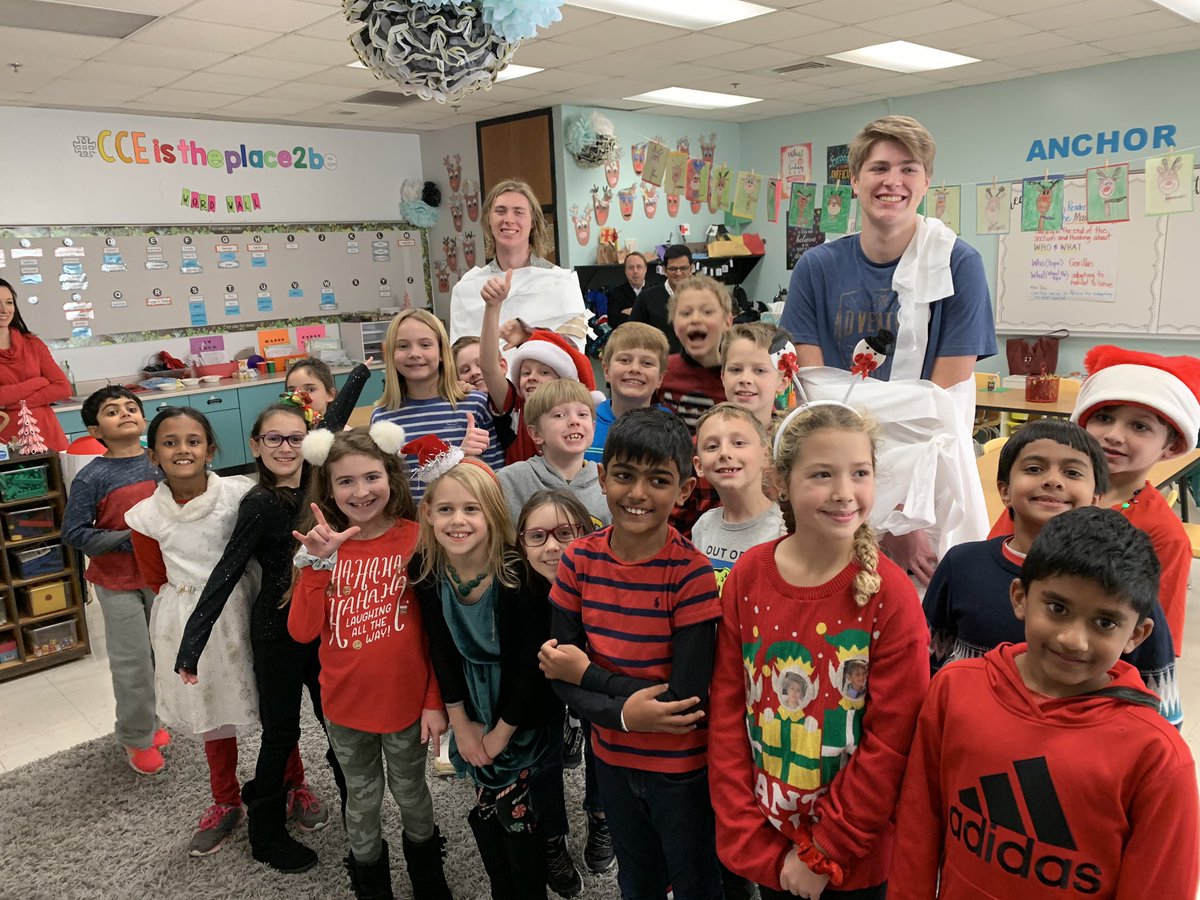 JennBeckman1's tweet photo. When your big brothers show up for the holiday party we put them to work!! Thank you to all the wonderful parents for putting on one fun celebration!! #CCEistheplace2be https://t.co/i01ygZDuJJ