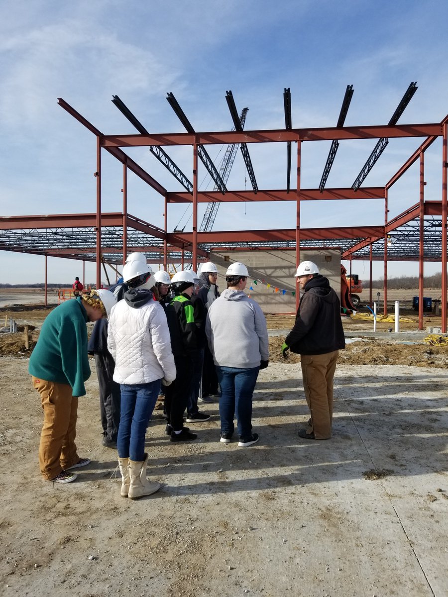 StoryConstrct's tweet image. Story superintendent Luke Trewin led a group of Boone High School students through the construction process at our office building project for Midland Power #Story85 #designbuild