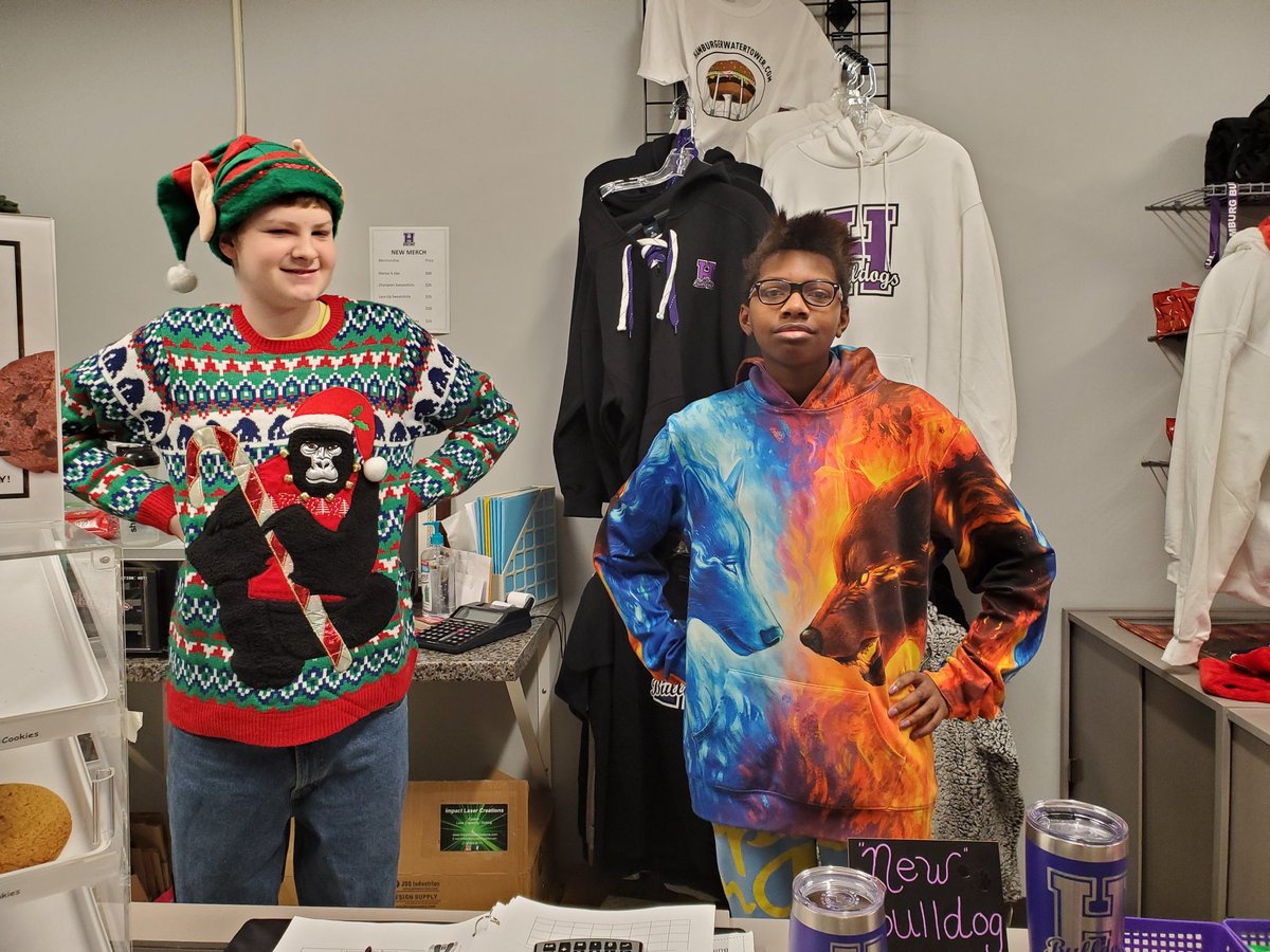 LSajdakHHSWBL's tweet photo. It's the big time! @StoreBulldog is open for business tonight for Boys' Basketball games. Come visit Anna and Alex. We have homemade holiday gifts, Hamburg spirit wear, drinks, and Krispy Kreme #wbl #investinskills #workforcedevelopment @CCCarole_716 #hcsdlearns  @HamStudentGovt https://t.co/N7vW5D2H6l