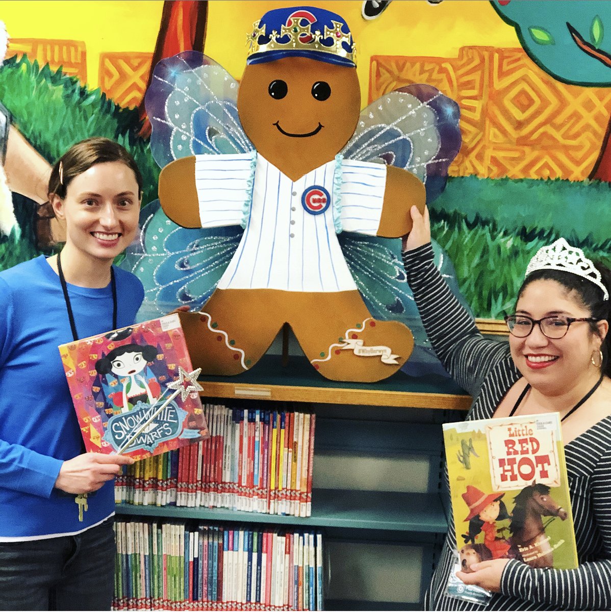 BerwynLibraryIL's tweet photo. It's never too early to start getting ready for #FairyTaleBall! Here's #Outreach Librarian Kelly and #YouthServices Librarian Marissa helping our special gingerbread friend get ready for the library's biggest program! #WhyBerwyn #SupportLocal #GingerbreadHunt #WhereinBerwyn https://t.co/WyGUg4i3Q2